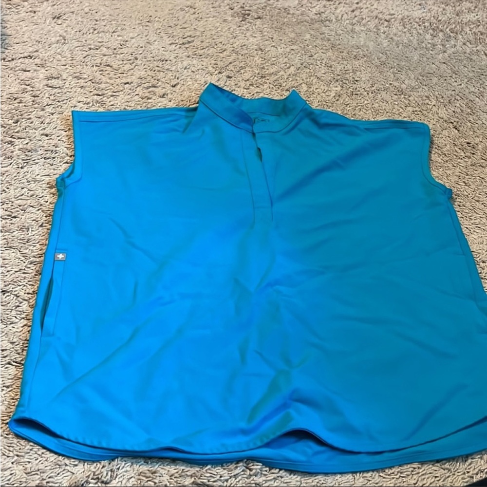 Teal Figs Scrubs in size small. Few uses only
